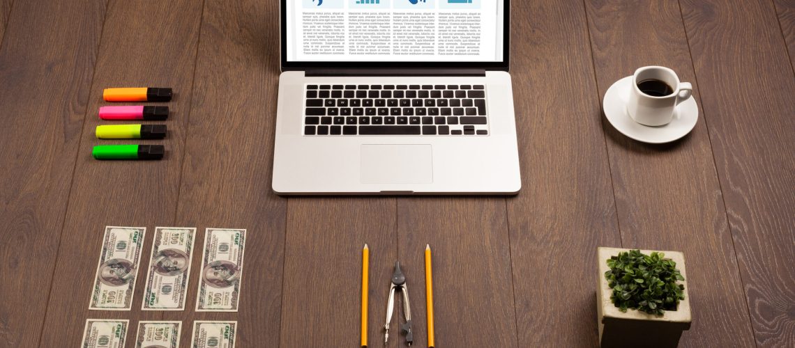 laptop-computer-on-wooden-desk-with-office-suplies-2026-01-09-14-44-57-utc