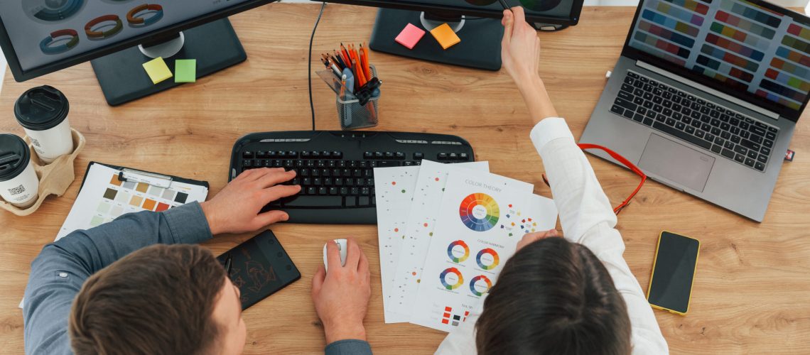 Top view. Two designers working together in the office.